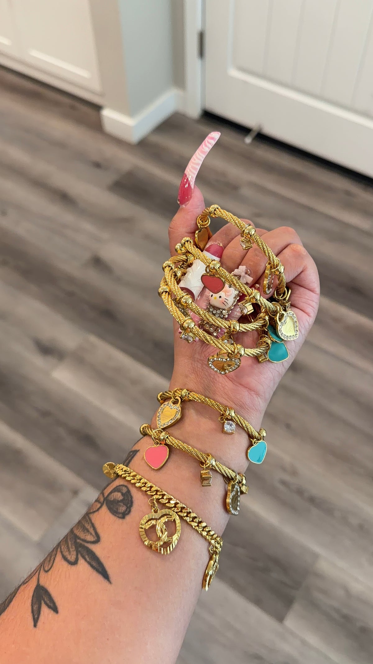 Tiff Co. Dangly Charm Bracelet